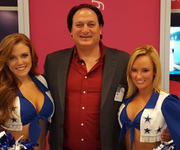 Dan Kost with the Dallas Cowboys Cheerleaders